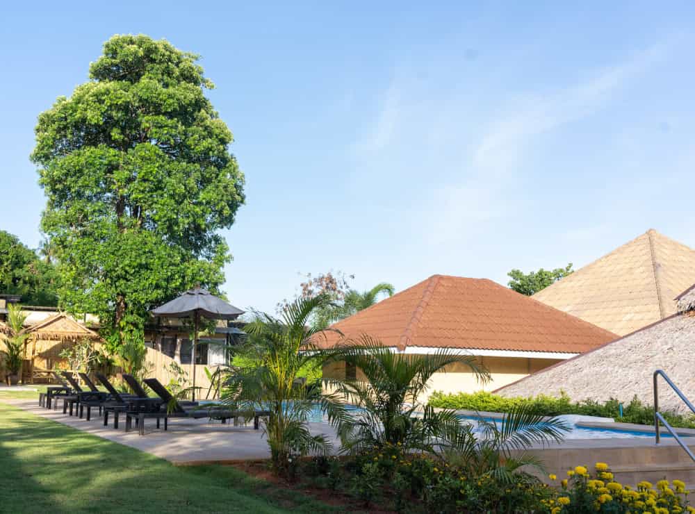 image of PhuketFit standard room pool and garden view at Thailand health & fitness resort
