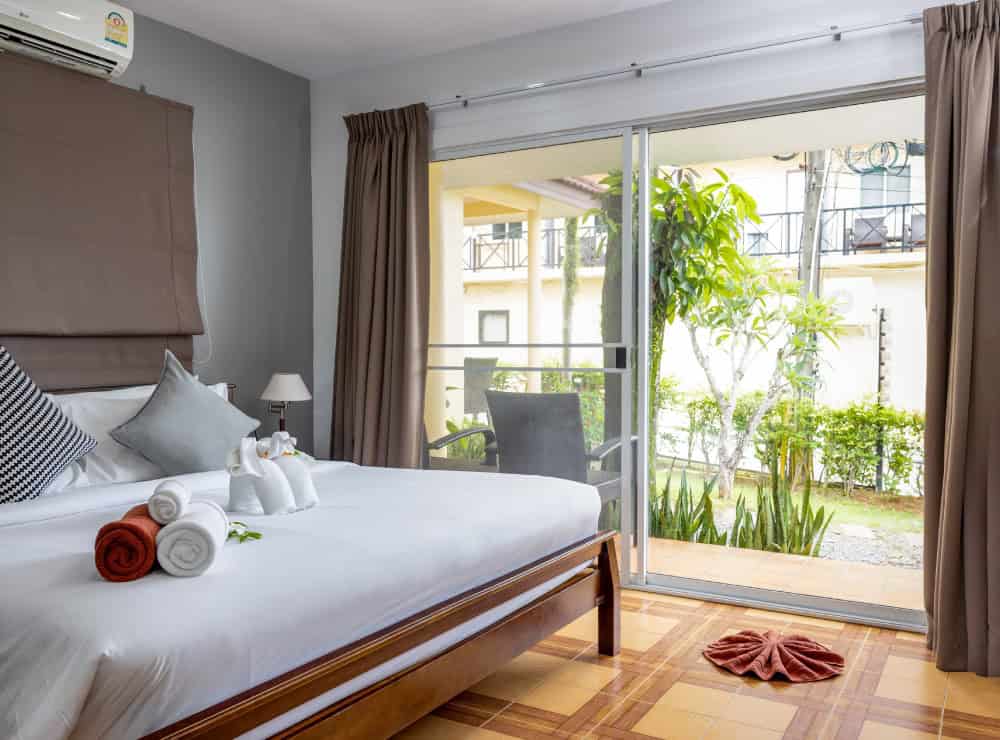 image of PhuketFit standard villa bed view at premier health & fitness Thailand resort