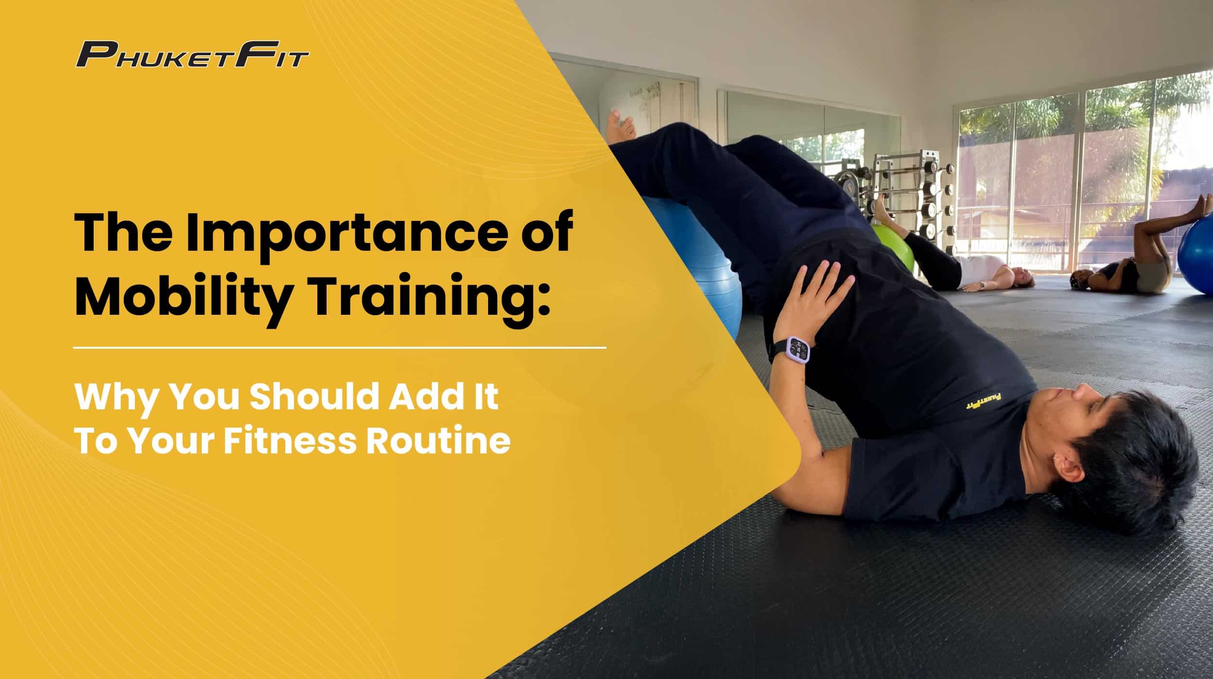 phuketfit-post-2025-importance-of-mobility-training-why-you-should-add-it-to-your-fitness-routine Coach instructing mobility training in yoga studio