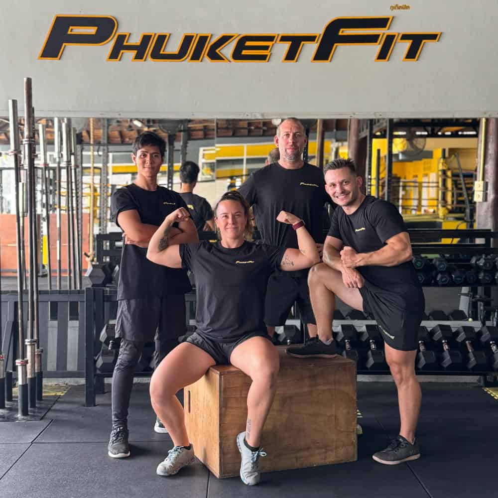 group photo of PhuketFit coaching team at health & fitness resort Thailand
