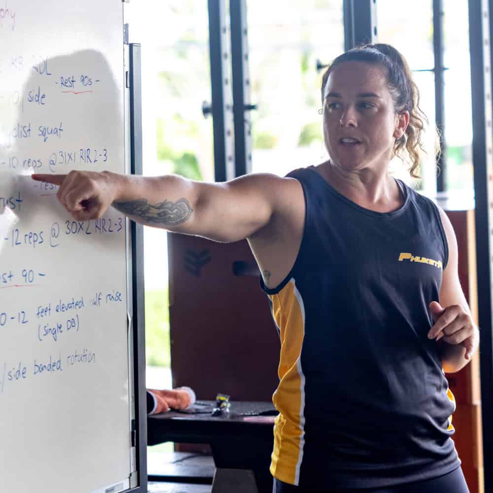 image of PhuketFit coach Victoria instructing class at fitness and weight loss camp