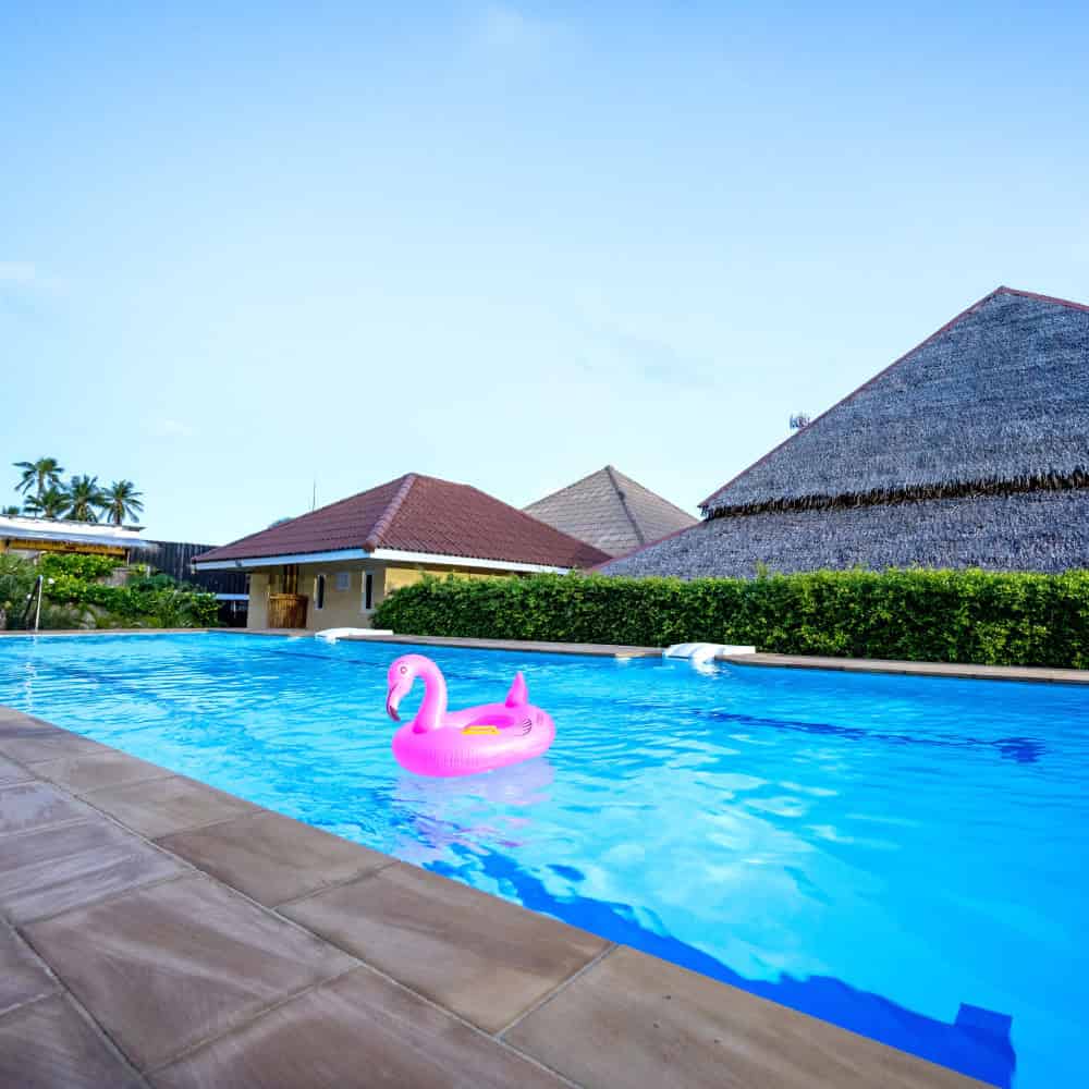 phuketfit-facilities-swimming-at-premier-health-and-fitness-retreat-thailand image of swimming pool at PhuketFit Thailand fitness bootcamp resort