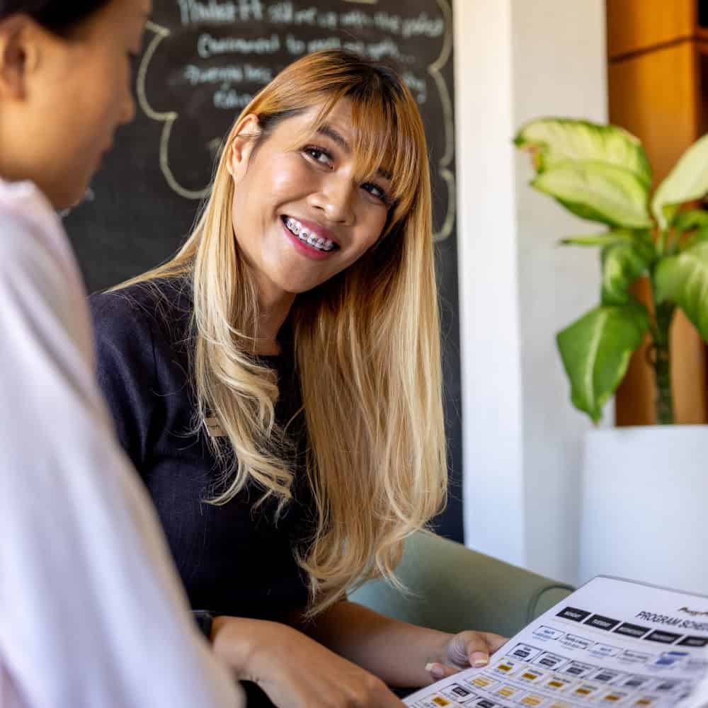 image of reception onboarding new guest at PhuketFit health and fitness retreat