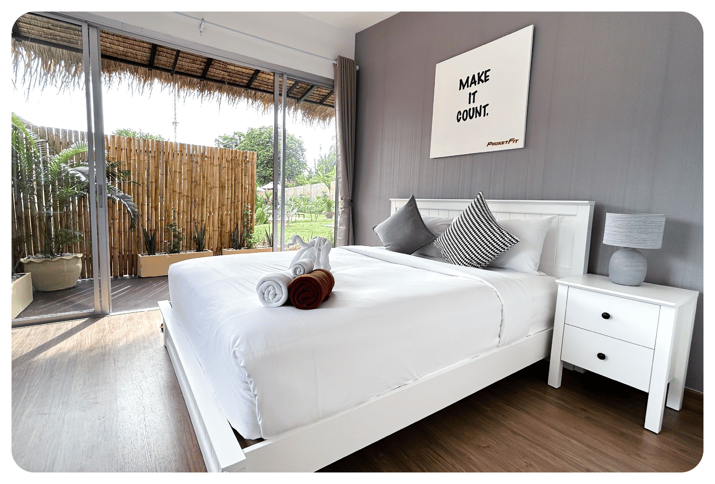 photo of double bed inside phuketfit standard room accommodation