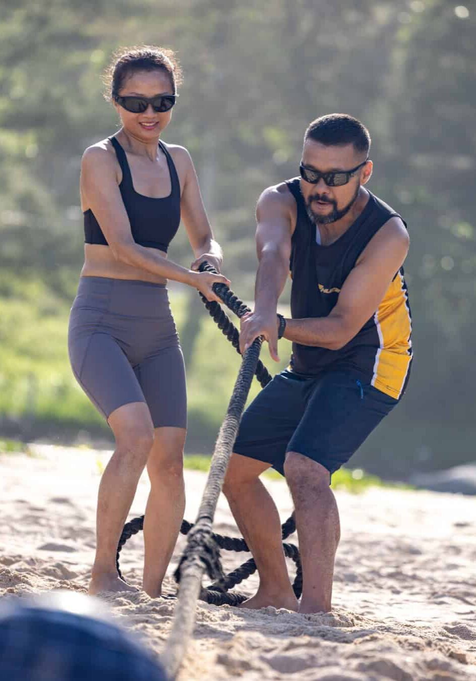 Photo of 2 friends on beach bootcamp with PhuketFit in Thailand